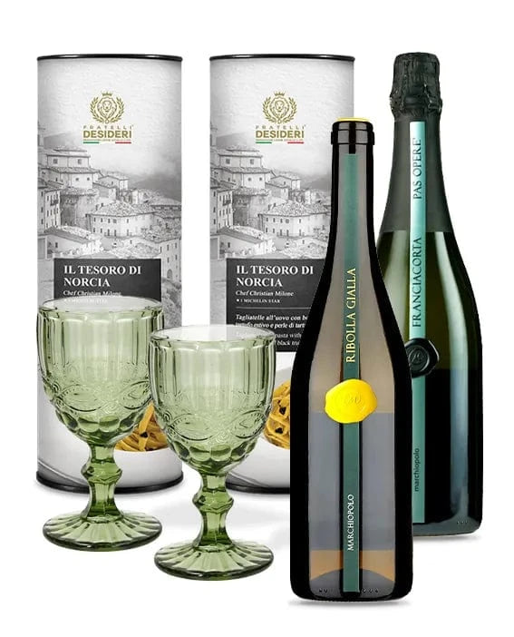 Il Tesoro di Norcia Double, il Marchiopolo Franciacorta, il Marchiopolo Ribolla Gialla e due calici verdi