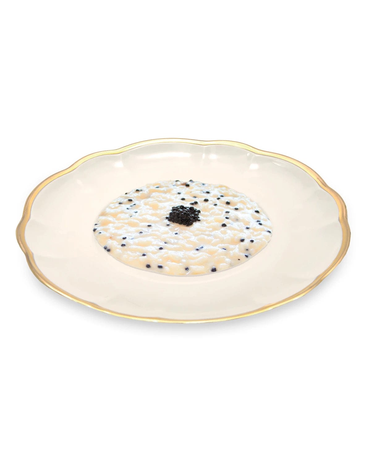 Impiattamento di Sua Maestà Bianco Tartufo di Christian Milone. È visibile il caratteristico perlage di tartufo nero al centro.